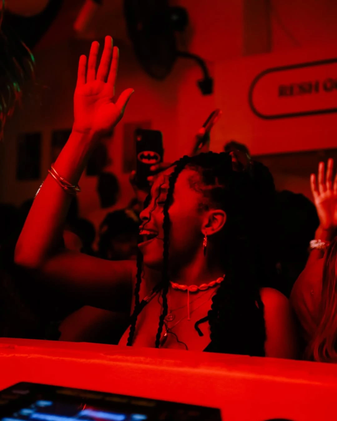 Afrobeats nightlife scene with stylish crowd at Night in Lagos Cape Town