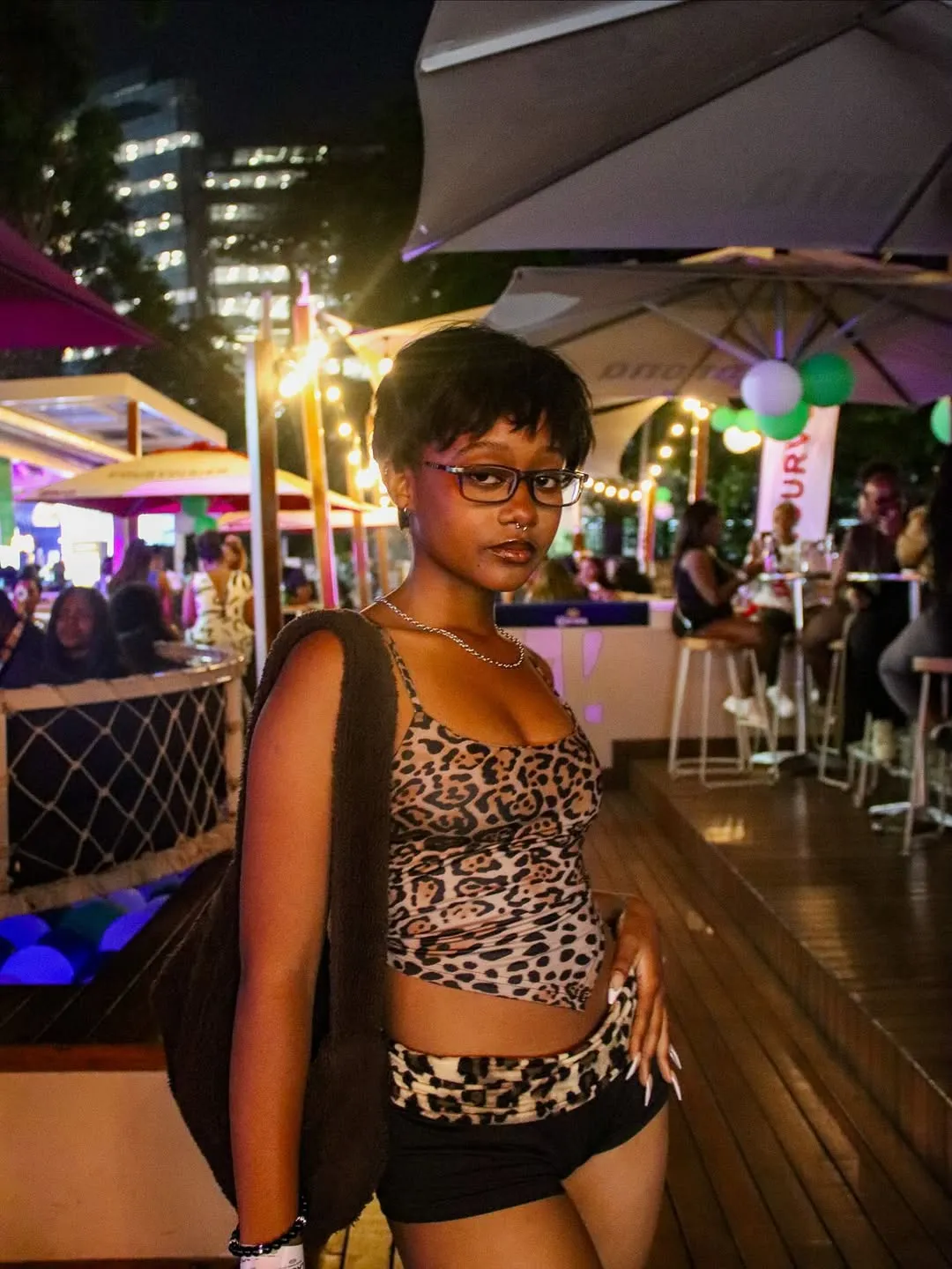 Afro-chic attendee enjoying Night in Lagos party in Johannesburg