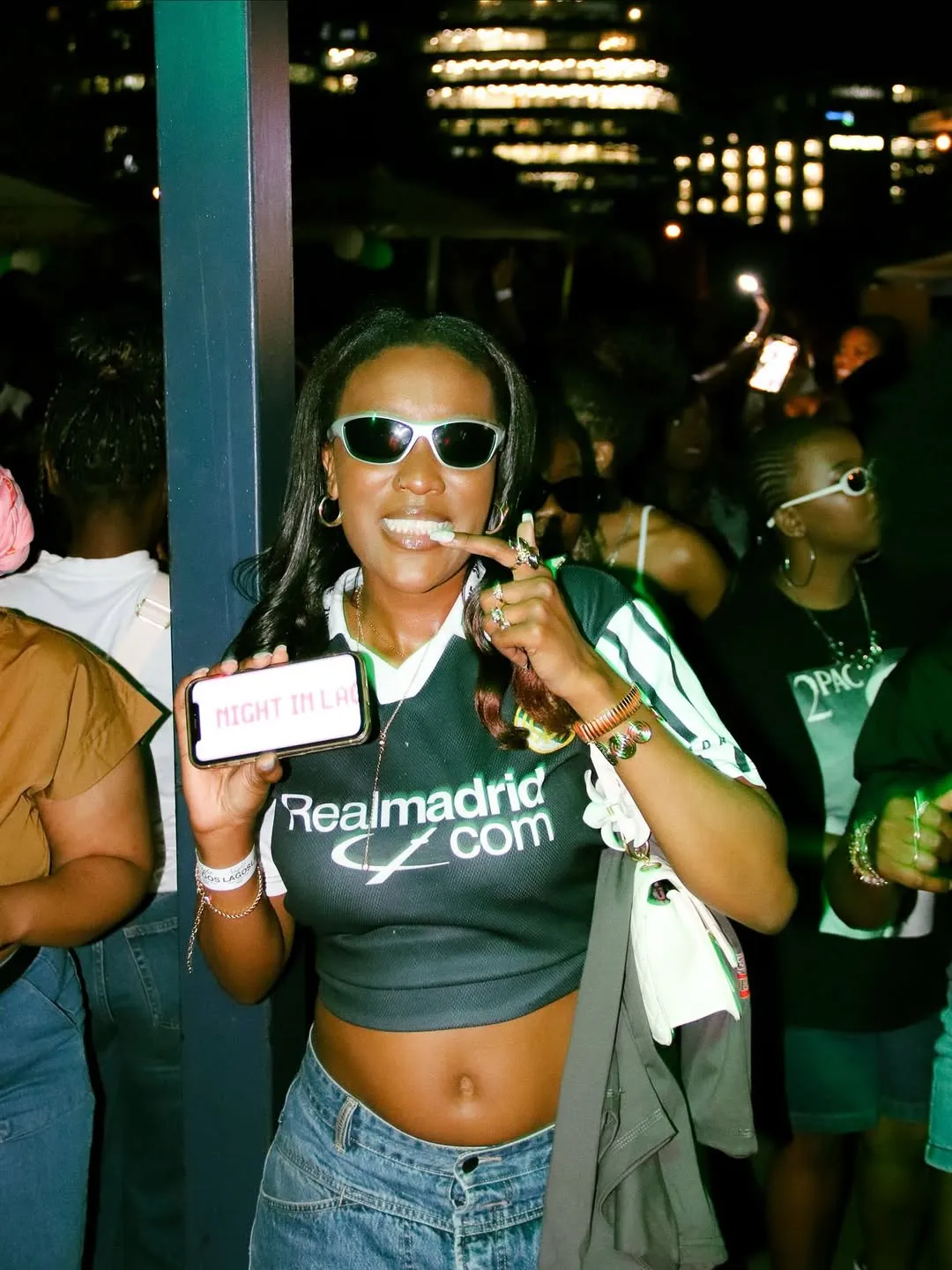 Female guest in Afro-Luxe outfit at Night in Lagos Joburg nightlife event