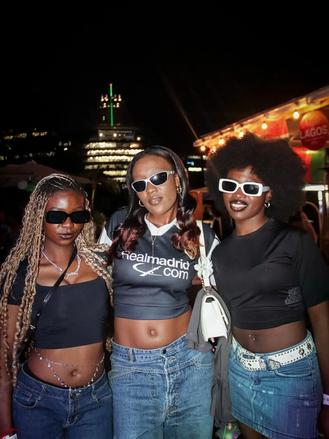  woman capturing the vibe at Night in Lagos Johannesburg